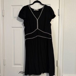 Elegant Black Dress with White Accents